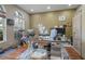 Bright office space with a large arched window, built-in shelving, and ample desk space, perfect for working from home at 10327 Meadow Crossing Dr, Tampa, FL 33647
