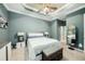 Comfortable main bedroom with neutral decor at 11220 Paradise Pointe Way, New Port Richey, FL 34654