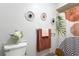Well-lit bathroom featuring a decorative shower curtain and unique wall decor at 12529 Knollbrook Ln, Hudson, FL 34669