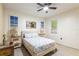 Comfortable bedroom featuring neutral walls and a window offering natural light at 12529 Knollbrook Ln, Hudson, FL 34669