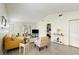 Living room features tile flooring and vaulted ceilings at 12529 Knollbrook Ln, Hudson, FL 34669