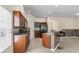 Well-equipped kitchen featuring stainless steel appliances and a functional kitchen island at 12631 Chenwood Ave, Hudson, FL 34669