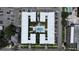 Aerial view of complex showcasing courtyard with pool, landscaping, and parking at 1301 S Howard Ave # A9, Tampa, FL 33606