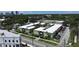 Aerial view showcasing complex layout and surrounding neighborhood streets with mature landscaping at 1301 S Howard Ave # A9, Tampa, FL 33606