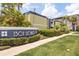 Well-maintained building exterior showcasing professional landscaping and clear building signage at 1301 S Howard Ave # A9, Tampa, FL 33606