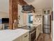 Well-equipped kitchen featuring stainless steel appliances and stylish tile work at 1301 S Howard Ave # A9, Tampa, FL 33606