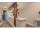 A clean, compact kitchen with light colored walls and countertops, and modern appliances at 1301 S Howard Ave # A9, Tampa, FL 33606