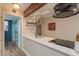 A sleek kitchen with modern appliances and trendy lighting at 1301 S Howard Ave # A9, Tampa, FL 33606