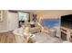 Cozy living space with ample seating, mural, and television at 1301 S Howard Ave # A9, Tampa, FL 33606