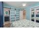 Bright main bedroom with sliding door access to an ensuite bathroom and a closet at 1301 S Howard Ave # A9, Tampa, FL 33606