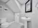 Under-stair half bath with pedestal sink and tile floors at 1312 Kelridge Pl, Brandon, FL 33511