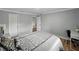 Spacious bedroom with wood-look floors and natural light offers a comfortable and serene atmosphere at 13285 Arbor Pointe Cir # 202, Tampa, FL 33617