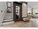 Spacious entryway with stairs, decorative elements, tile flooring and connecting rooms at 14135 Stowbridge Ave, Tampa, FL 33626