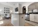 Kitchen with breakfast nook featuring a center island and stainless steel dishwasher at 14135 Stowbridge Ave, Tampa, FL 33626