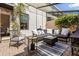 Enclosed patio area featuring comfortable seating, a small table, and a decorative outdoor rug at 14135 Stowbridge Ave, Tampa, FL 33626