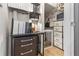 View of the walk-in closet featuring wire shelving, drawers, and a stylish lamp at 14135 Stowbridge Ave, Tampa, FL 33626