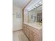 A bathroom with a double sink and cabinets at 1441 S Hercules Ave, Clearwater, FL 33764