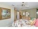 Comfortable bedroom with light-wood furniture, neutral carpet, and a view of the outdoors at 1441 S Hercules Ave, Clearwater, FL 33764