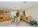 Dining area featuring stylish furniture and a clear view of the built-in shelving at 1441 S Hercules Ave, Clearwater, FL 33764