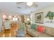 Bright and open living space leads to the kitchen area, featuring hardwood floors and comfortable seating at 1441 S Hercules Ave, Clearwater, FL 33764