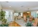 Spacious living room with ample natural light, neutral colors, and a dining area at 1441 S Hercules Ave, Clearwater, FL 33764