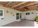 Tiled patio with wood ceiling and sliding glass door at 1441 S Hercules Ave, Clearwater, FL 33764