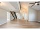 Spacious and bright living room featuring new floors, staircase, neutral colors, and lots of natural light at 14909 Oldgate Pl, Tampa, FL 33624