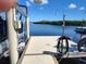 The property's dock is equipped with essential amenities, including a boat lift, perfect for water enthusiasts at 1626 Sea Breeze Dr, Tarpon Springs, FL 34689