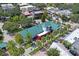 Charming neighborhood featuring local businesses, tree-lined streets, and vibrant community spaces offers a unique urban living experience at 1707 Solon Ave, Dunedin, FL 34698