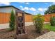 Backyard fountain and lush landscaping provide a serene outdoor space at 1707 Solon Ave, Dunedin, FL 34698