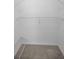 Walk-in closet with a wire rack shelving unit, perfect for organizing clothing at 18168 Clearview Dr, Brooksville, FL 34604