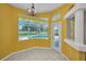 Bright dining area with pool view and direct access to the backyard at 18168 Clearview Dr, Brooksville, FL 34604