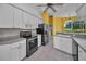 Modern kitchen featuring stainless steel appliances and ample counter space at 18168 Clearview Dr, Brooksville, FL 34604
