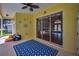 The screened lanai features tile flooring and overlooks the pool area at 18168 Clearview Dr, Brooksville, FL 34604