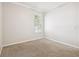 Bedroom features carpet floors, and shuttered windows at 18203 Tivoli Ln, Lutz, FL 33558