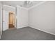 Bright bedroom features carpet floors and neutral walls at 18203 Tivoli Ln, Lutz, FL 33558