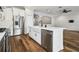 Chic kitchen featuring stainless steel appliances and a large island at 18203 Tivoli Ln, Lutz, FL 33558