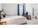 Bright bedroom with a large window, plush carpet, and a tidy, minimalist decor at 18527 Cortes Creek Blvd, Spring Hill, FL 34610