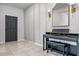 Stylish tiled entrance with a Donner piano and stool, complemented by modern lighting and wall decor at 18527 Cortes Creek Blvd, Spring Hill, FL 34610