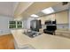 Bright kitchen featuring stainless steel appliances and a window overlooking the backyard at 1902 Elaine Dr, Clearwater, FL 33760