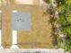 Aerial view of a home with a new roof, driveway, and yard with new sod at 19275 Wildwood Dr, Brooksville, FL 34601