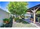 Cozy backyard featuring a gazebo with outdoor seating and lush landscaping at 19555 Timberbluff Dr, Land O Lakes, FL 34638