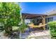 Charming backyard with a covered patio, perfect for outdoor relaxation and entertaining at 19555 Timberbluff Dr, Land O Lakes, FL 34638