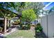 Relaxing backyard with a covered patio, perfect for outdoor dining and entertaining at 19555 Timberbluff Dr, Land O Lakes, FL 34638