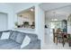 Open living area with a view of the kitchen and dining area, perfect for entertaining and Gathering gatherings at 19555 Timberbluff Dr, Land O Lakes, FL 34638