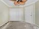 Bedroom features double door closet and single door entrance at 2068 Diane Ave, Palm Harbor, FL 34683