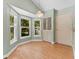 Charming breakfast nook featuring bay windows with lots of natural light, and a storage closet at 2068 Diane Ave, Palm Harbor, FL 34683