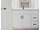 Bathroom vanity with modern fixtures and ample storage space at 2141 Coachman Rd, Spring Hill, FL 34608