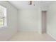 Bright bedroom with a ceiling fan and a window allowing natural light at 2141 Coachman Rd, Spring Hill, FL 34608