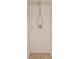 A clean shower stall featuring tile and modern shower head fixture at 2141 Coachman Rd, Spring Hill, FL 34608
